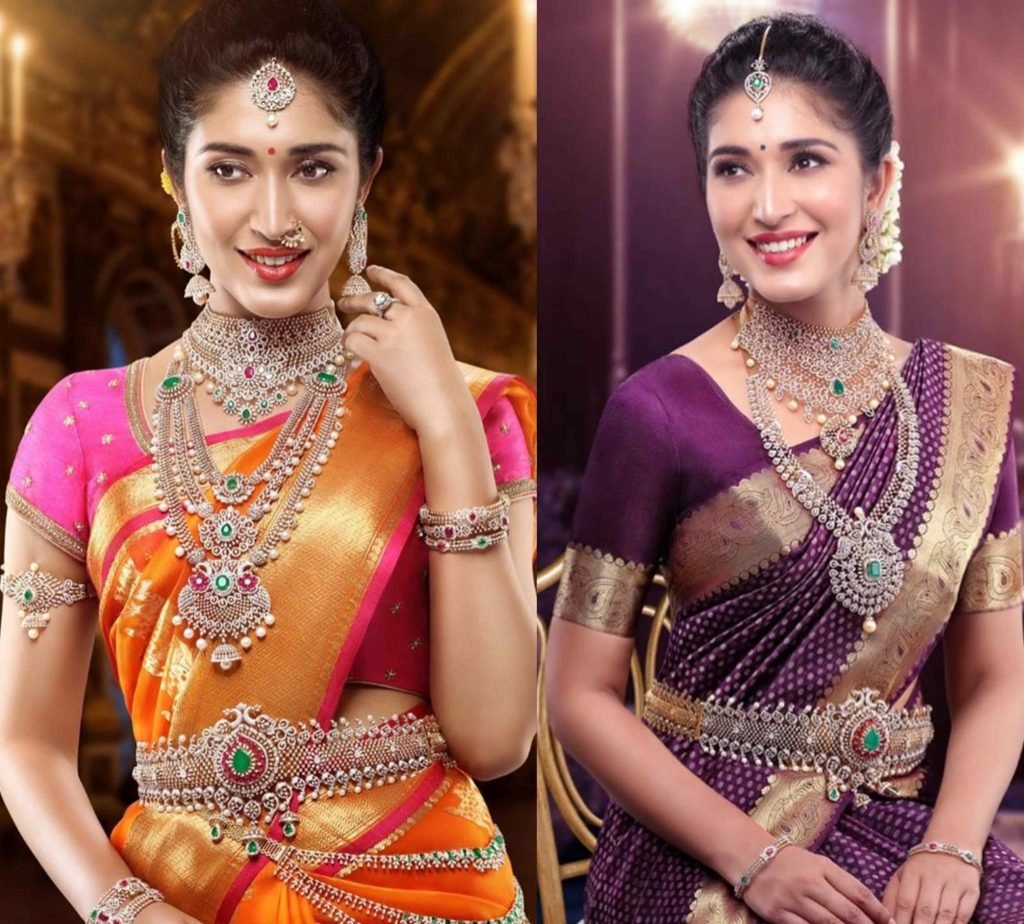 Young South Indian model in bridal red sari with golden jewelry set.  Looking away from camera Stock Photo - Alamy